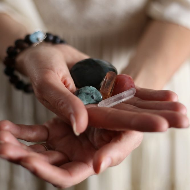 Woman's,Hands,Holding,Crystals.